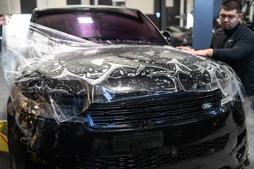 ppf brisbane paint protection film installation clear bra installation brisbane front end protection ppf wrap brisbane bonnet and guards protection paint protection film self healing demonstration brisbane ppf edge wrap detail close up brisbane