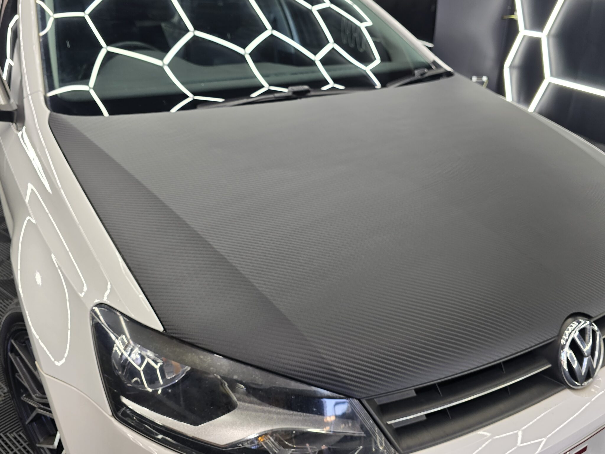 vehicle wraps brisbane colour change wrap finish vinyl wrap brisbane satin black car wrap car wrap installation brisbane full colour change custom vehicle wraps brisbane gloss finish vinyl wrap detailing edges close up brisbane commercial vehicle wrap brisbane branding design