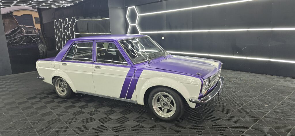 vehicle wraps brisbane colour change wrap finish vinyl wrap brisbane satin black car wrap car wrap installation brisbane full colour change custom vehicle wraps brisbane gloss finish vinyl wrap detailing edges close up brisbane commercial vehicle wrap brisbane branding design